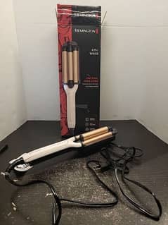 Remington 4 in 1 hair curler.