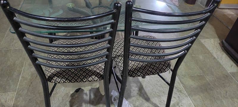 iron dining table with 4 chairs 1