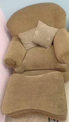 Sofa with foot rest in a good condition