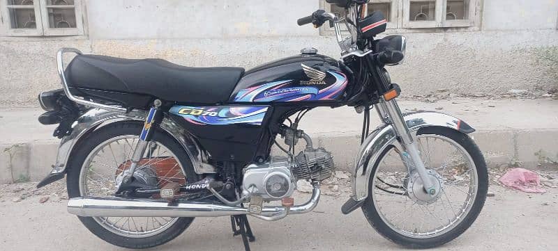 Honda CD 70 2024 6 month brand new showroom condition only 6000 km use 13