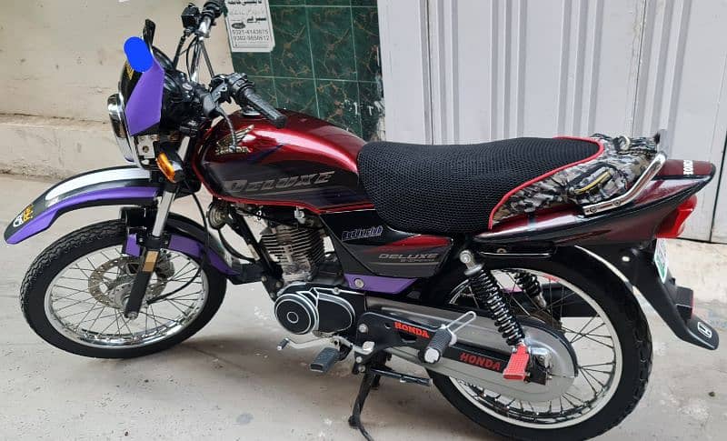 Honda Deluxe 2018 model 2019 Registered 3 Digit Lahore Nmbr 10/10 new. 1