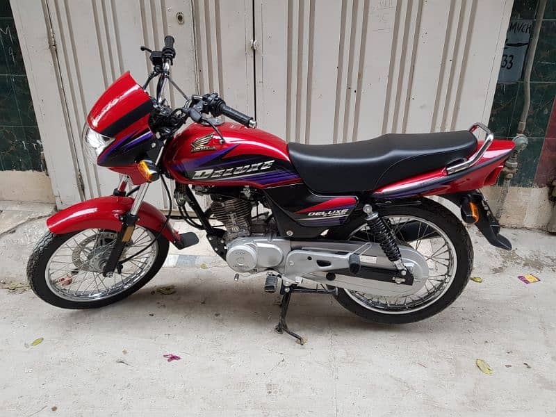 Honda Deluxe 2018 model 2019 Registered 3 Digit Lahore Nmbr 10/10 new. 8