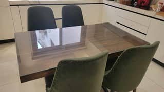 Wooden dining table with chairs