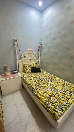 single bed with side tabel in a very good condition .