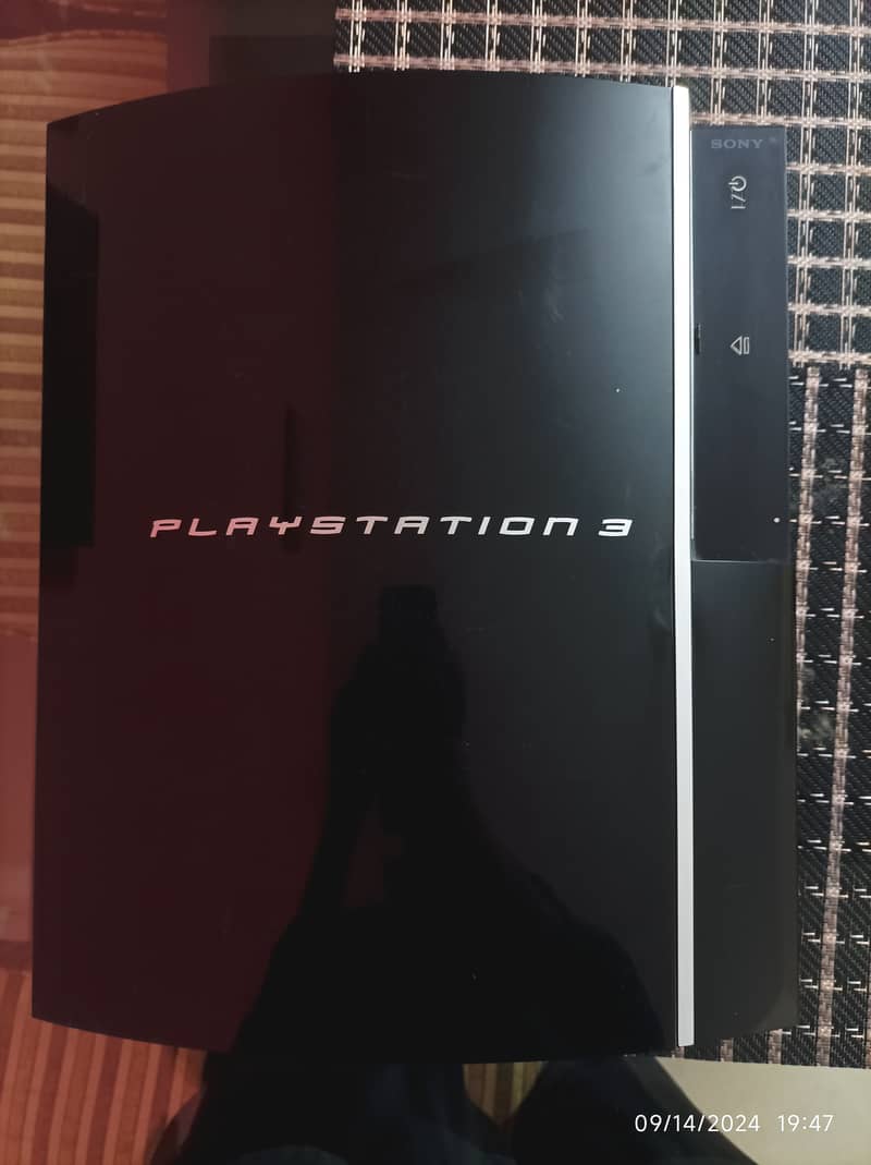 Playstation 3 with 5 new condition games 0