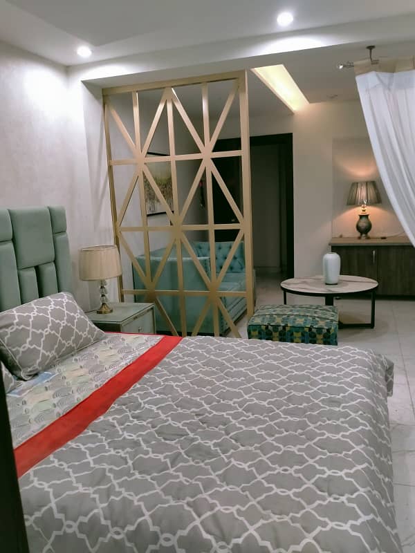 BRAND NEW STUDIO FULL FURNISHED FULL LUXURY IDEAL LOCATION FLAT FOR SALE IN BAHRIA TOWN LAHORE 10