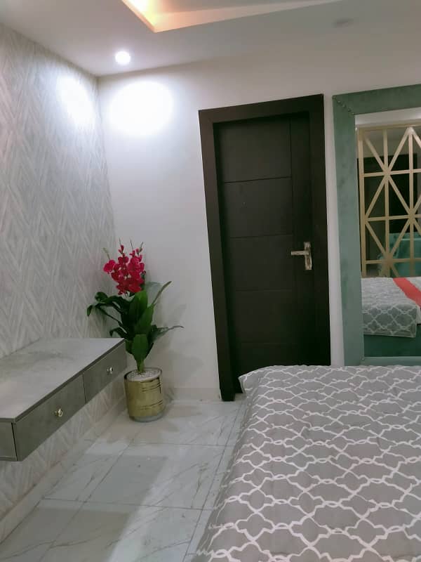 BRAND NEW STUDIO FULL FURNISHED FULL LUXURY IDEAL LOCATION FLAT FOR SALE IN BAHRIA TOWN LAHORE 13