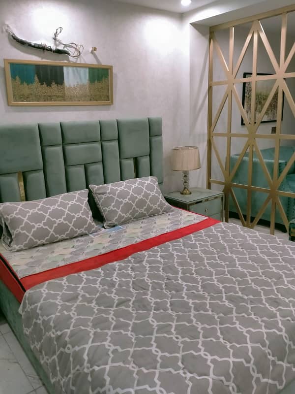 BRAND NEW STUDIO FULL FURNISHED FULL LUXURY IDEAL LOCATION FLAT FOR SALE IN BAHRIA TOWN LAHORE 0