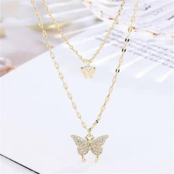 Golden plated double layered butterfly design locket 4