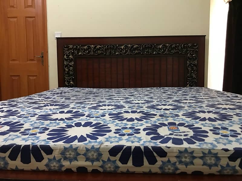 king size bed with free dressing table and one side table 2