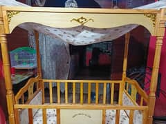 Baby code wooden double bed.