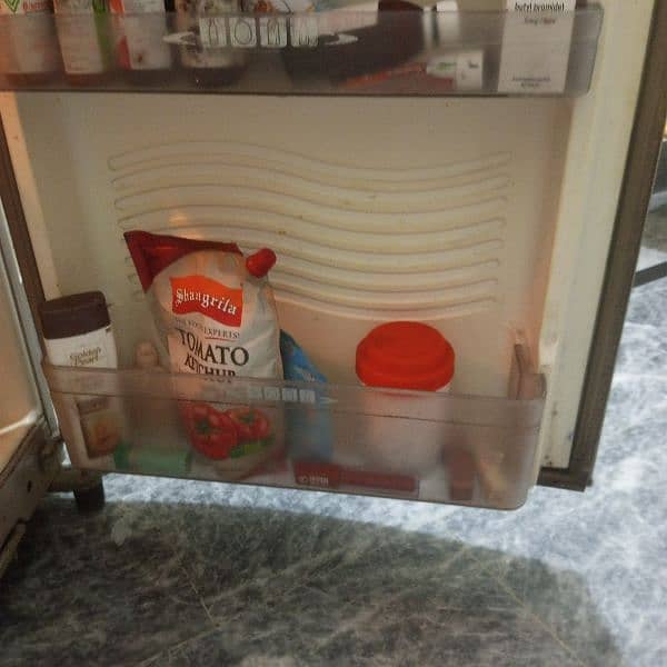 Dawlance Medium size fridge in good cooling condition. 9