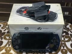 PSP 3004 (WITH BOX,CHARGER AND GAMES)