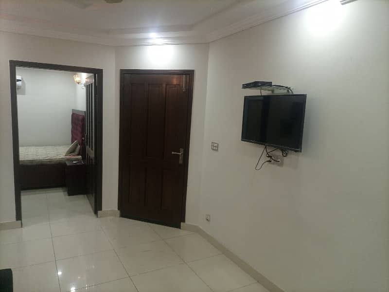 2 BED ROOMS FULLY LUXURY AND FULLY FURNISH IDEAL LOCATION EXCELLENT FLAT FOR RENT IN BAHRIA TOWN LAHORE 10