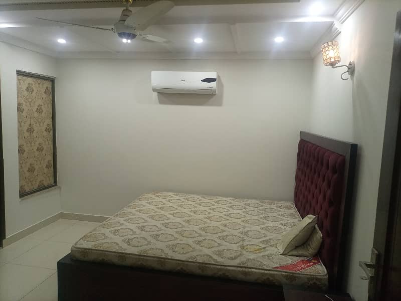 2 BED ROOMS FULLY LUXURY AND FULLY FURNISH IDEAL LOCATION EXCELLENT FLAT FOR RENT IN BAHRIA TOWN LAHORE 12