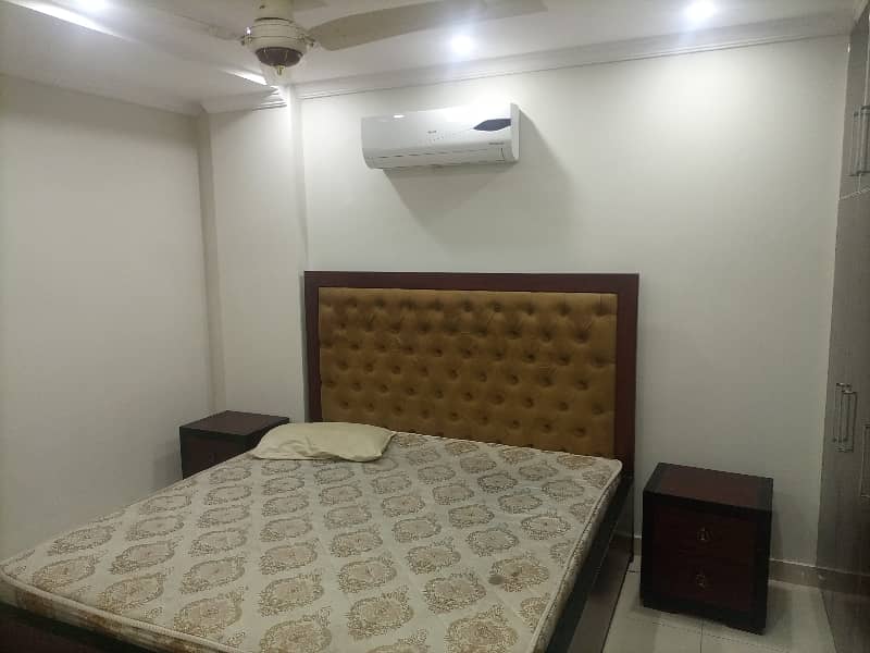 2 BED ROOMS FULLY LUXURY AND FULLY FURNISH IDEAL LOCATION EXCELLENT FLAT FOR RENT IN BAHRIA TOWN LAHORE 14