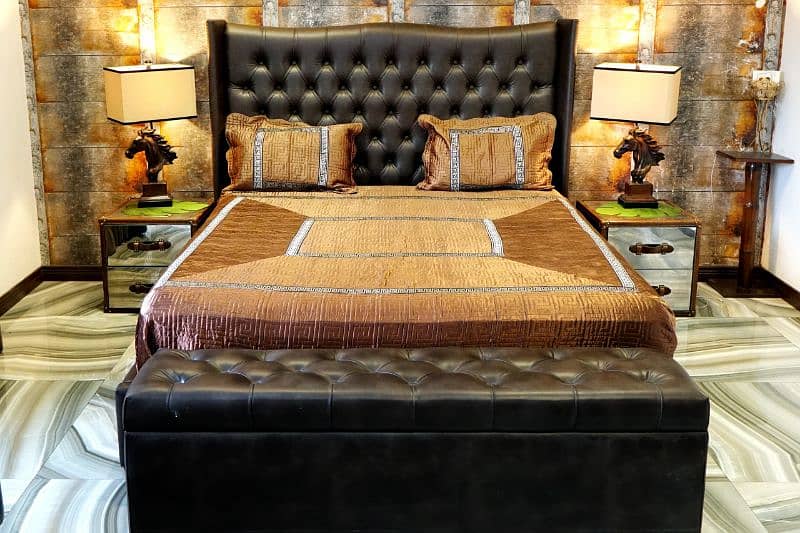 Queen size bed with side tables one mirror and sofas 4