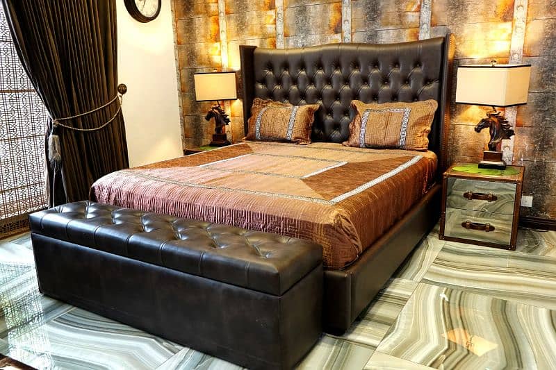 Queen size bed with side tables one mirror and sofas 8