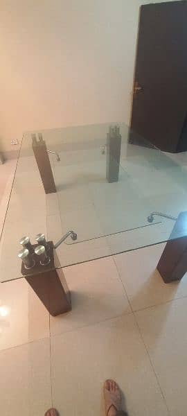 Double glass Dining table with 6 chairs. 1