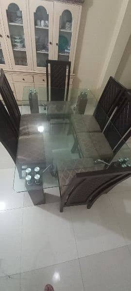 Double glass Dining table with 6 chairs. 2