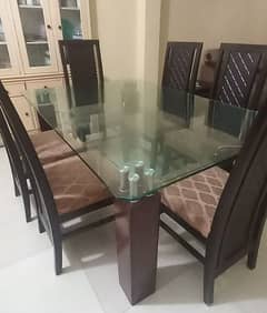 Double glass Dining table with 6 chairs. 0