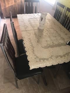 6 seater glass dining table, price negotiable