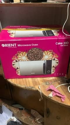 Orient microwave oven black color urjent sale