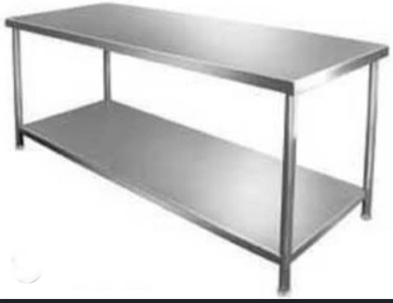 SS table (7ft x 2.5ft) for sale 60,000Rs urgent. 0