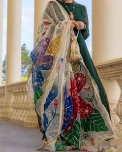 Floral organza dupatta with plain green maxi and pouch .