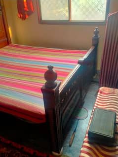 wooden double bed