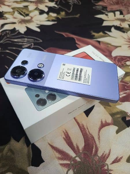 Redmi note 13 pro 8/256 box open 11 months worantyy can't 03161142266 0