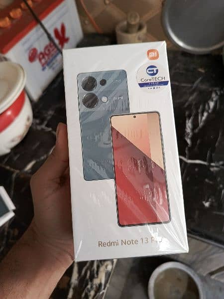 Redmi note 13 pro 8/256 box open 11 months worantyy can't 03161142266 8