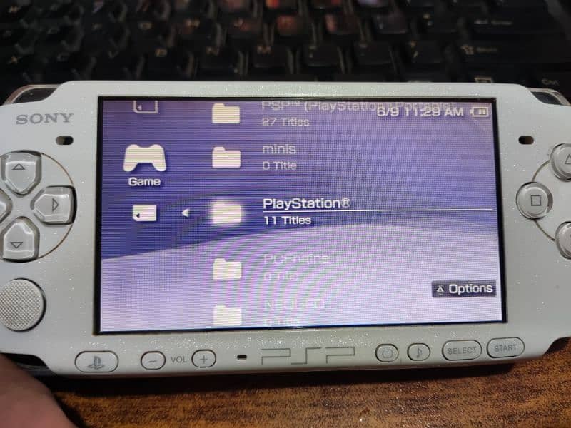 PSP(3000)Slim jailbreak 32gb 40 pre games installed 8