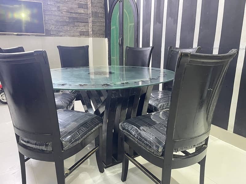 Black 6 seater round dining table 4