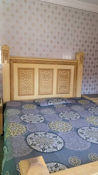 king-size bed with side tables and dressing 0