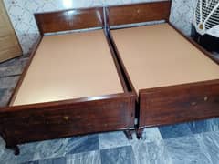 2 single beds pure Tali wood new condition