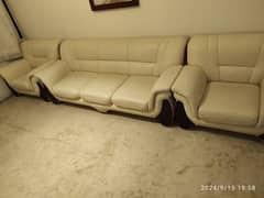 sofa set with off white synthetic leather upholstery