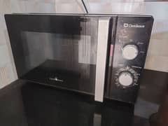 Dawlance Microwave oven almost new. . . . . 03228842510