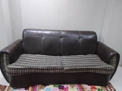 5-seater, sofa set. Brown coloured, leathered and chequed.