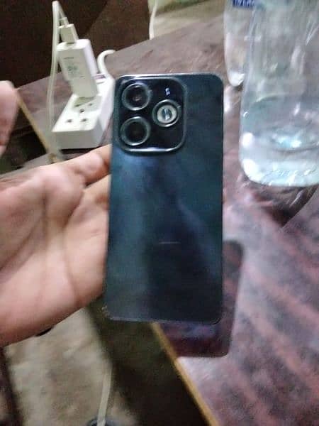 Infinix hot 40i 8+8 128 10 bay 10 condition 5