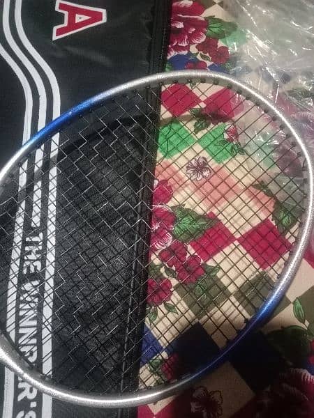 It is a new racket . it's very high quality racket of "hi qua" company 12