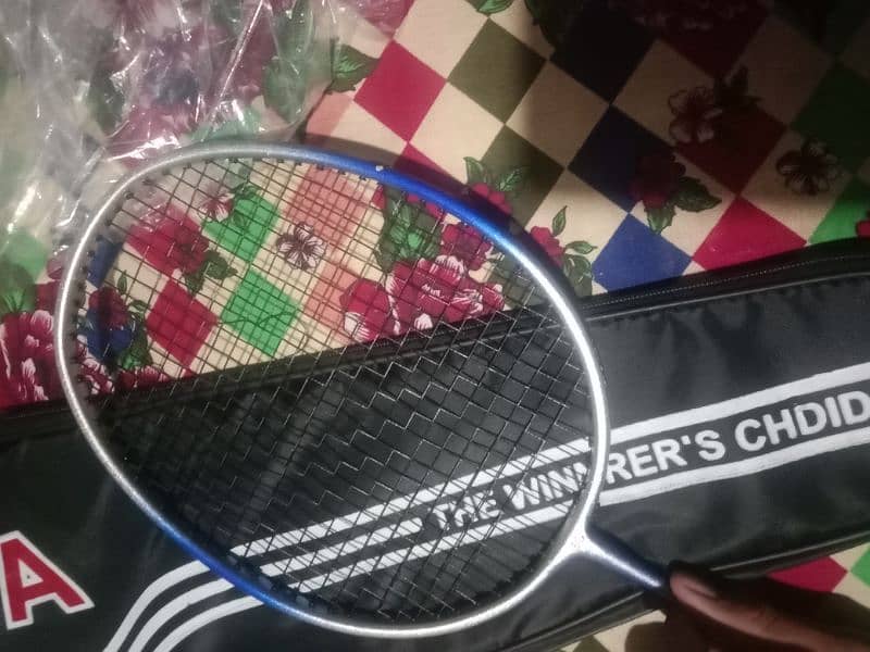 It is a new racket . it's very high quality racket of "hi qua" company 13