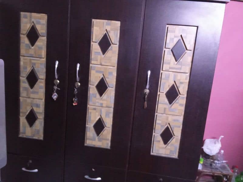 wooden bed set and cupboard 3