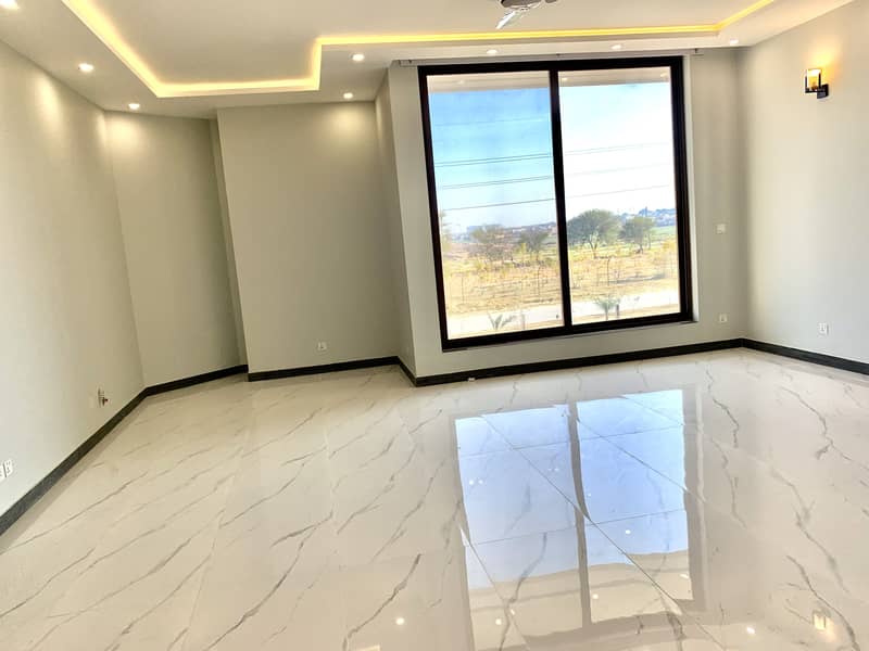 Brand New Beautiful Luxurious A++ Construction & Finishing and Tiles Flooring Corner House with Extra Land Available for Rent in D-12/1 Islamabad 17