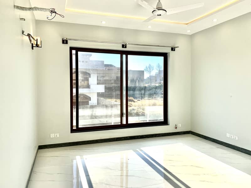 Brand New Beautiful Luxurious A++ Construction & Finishing and Tiles Flooring Corner House with Extra Land Available for Rent in D-12/1 Islamabad 24