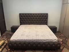 Bed with orthopedic mattress