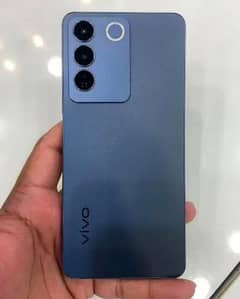 selling my vivo v27e 8/25 swith official warranty