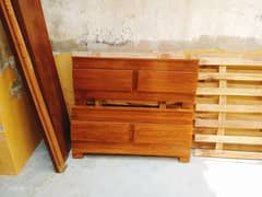 2 wooden single beds