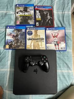 ps4 slim 1tb Dubai version with 5 games