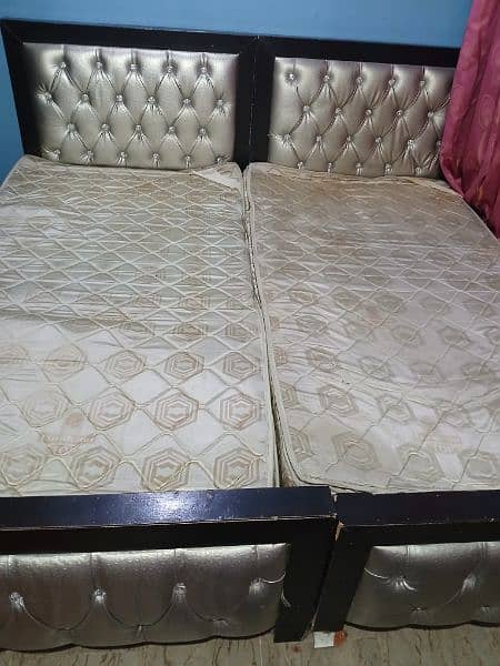 2 single bed wd matress in very cheap price 1